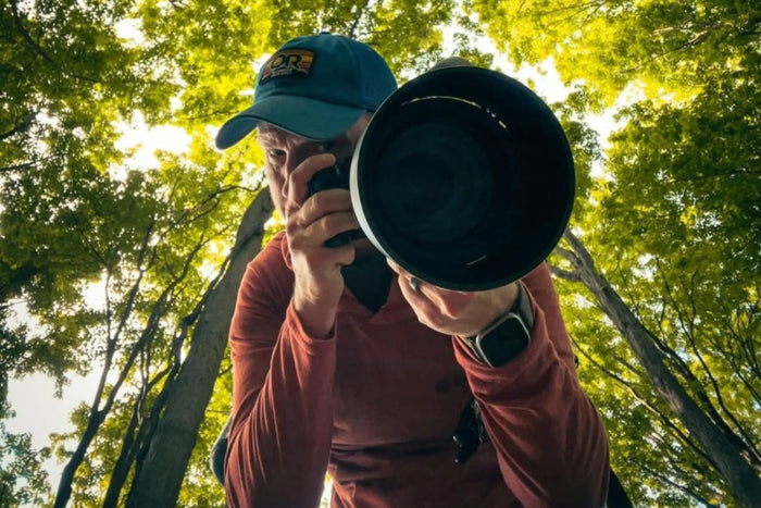 A photographer pretending to take a picture from a POV