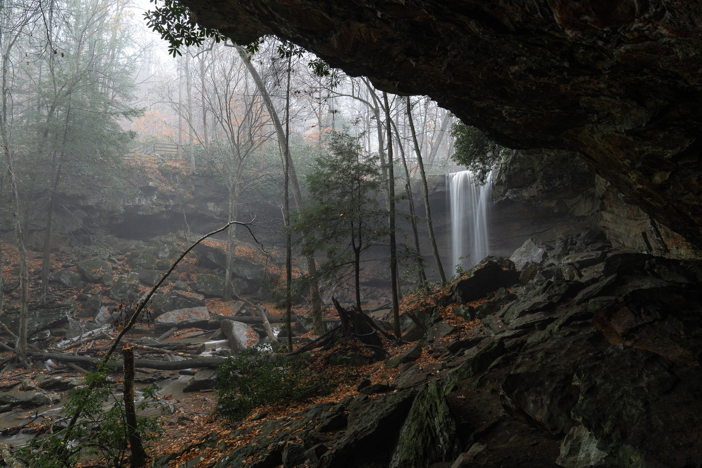 a long exposure of cucumber falls with rock formations